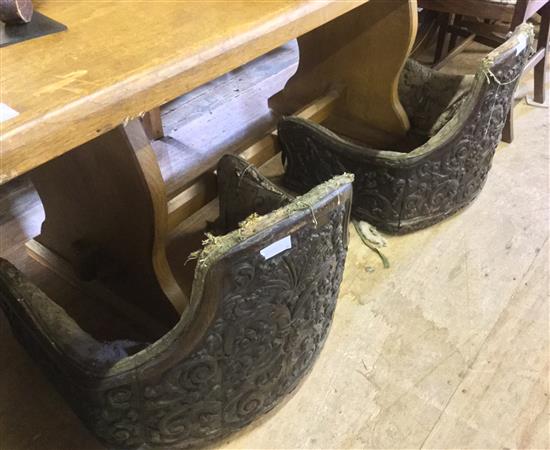 A pair of Flemish carved oak sleigh? chair backs